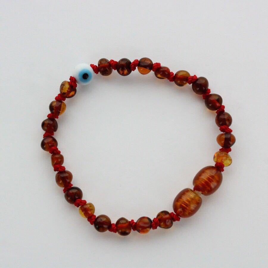 Pulsera bebé evil eye cognac - Ambar A la ru ru 